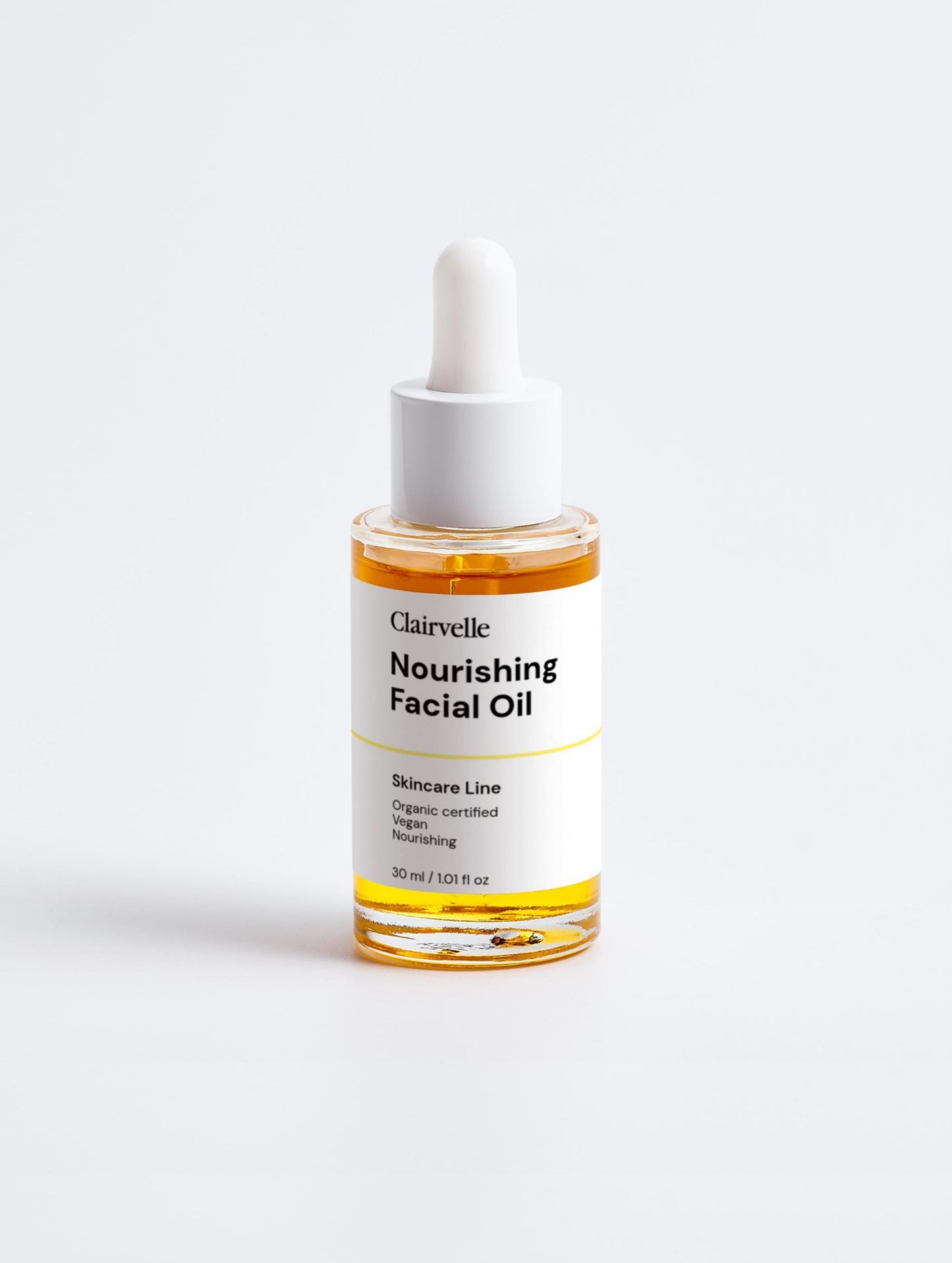 Bottle of Clairvelle Nourishing Facial Oil on a white background