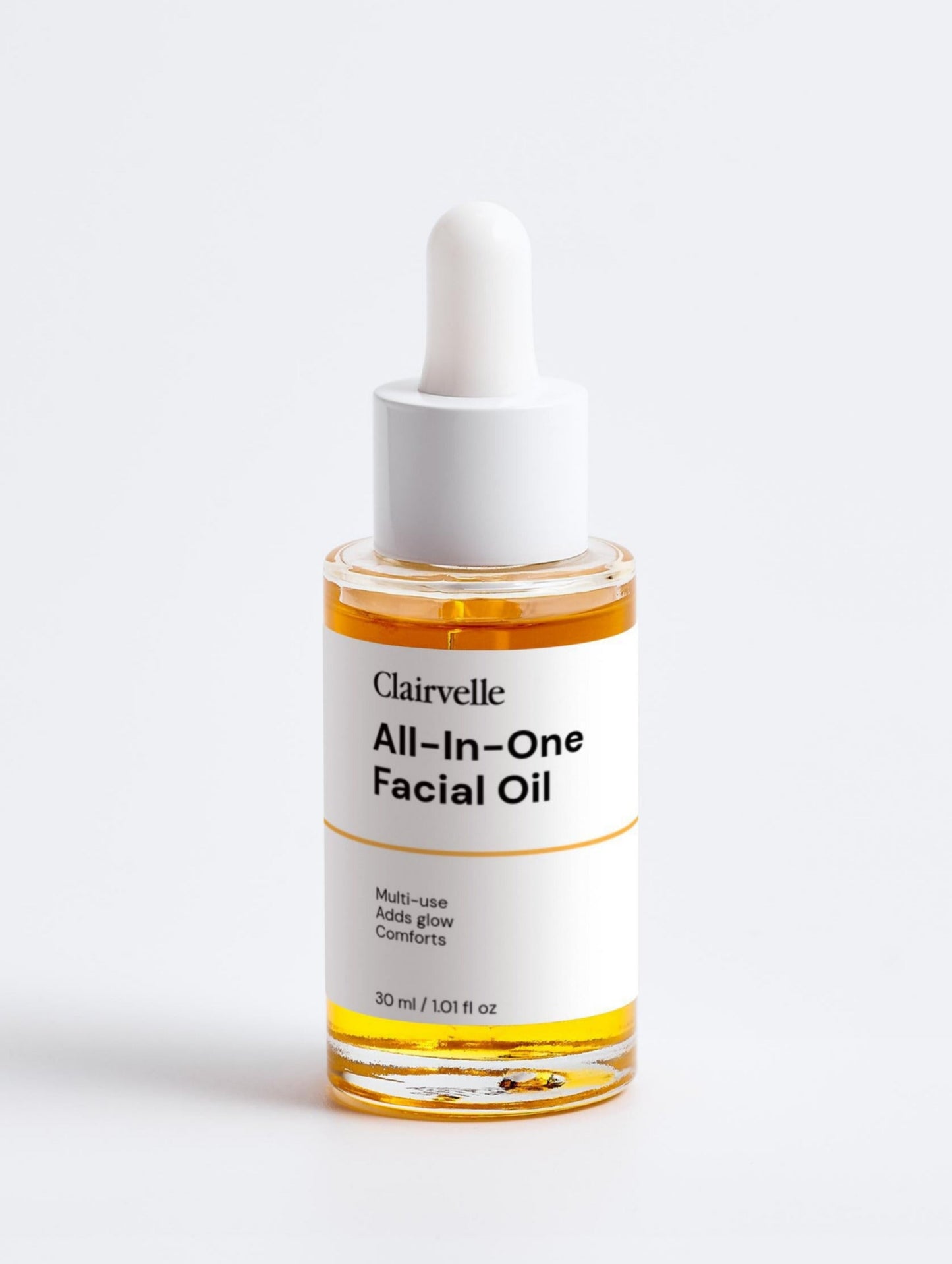 Clairvelle All-in-One Facial Oil bottle with dropper on a white background