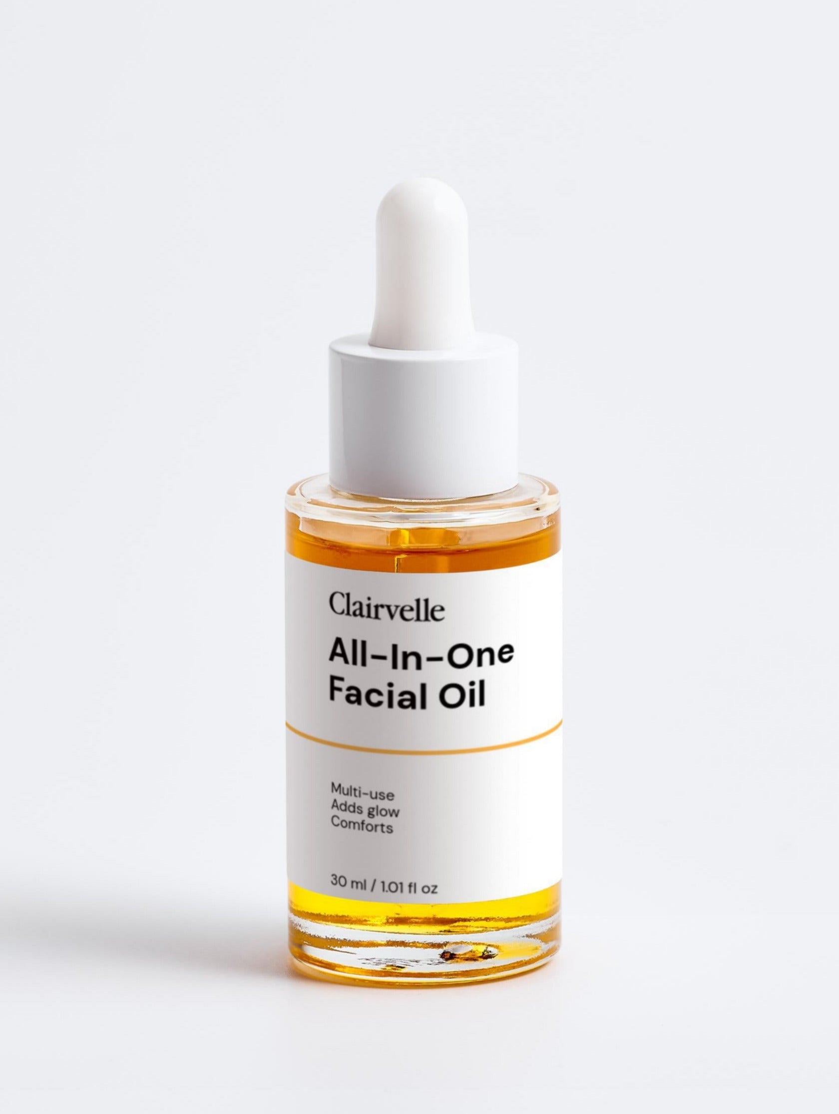 Clairvelle All-in-One Facial Oil bottle with dropper on a white background